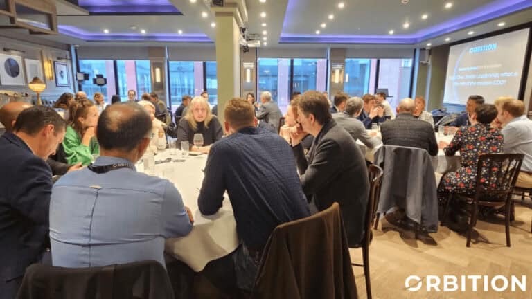 Driven by Data: Events - an image of one of our past events showing data leaders gathered together learning about employer branding